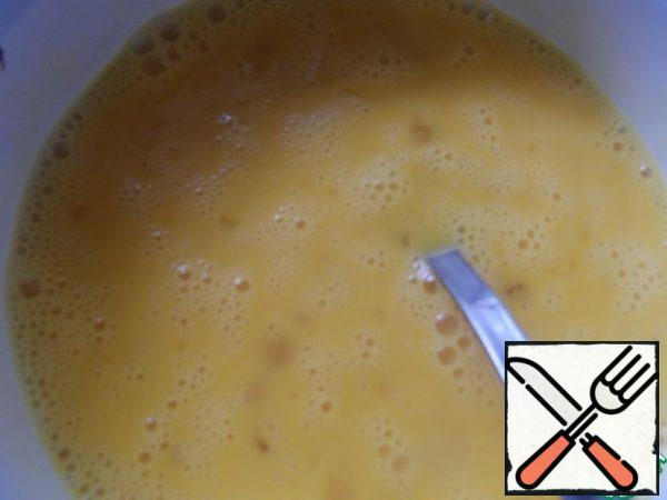 In a separate bowl, whisk the eggs.

