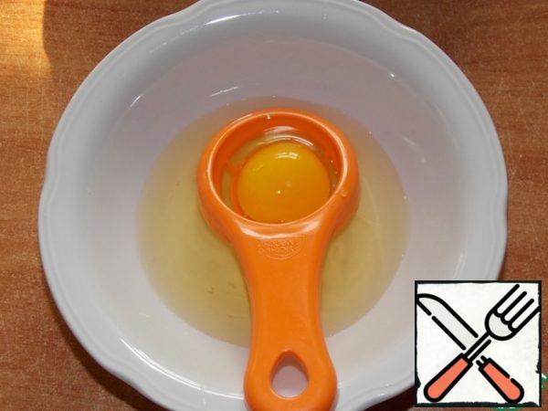 Separate the yolks from the whites.
All you need is the yolks.