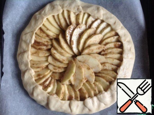 Gently wrap the edges of the dough on the filling, pinching in a circle.