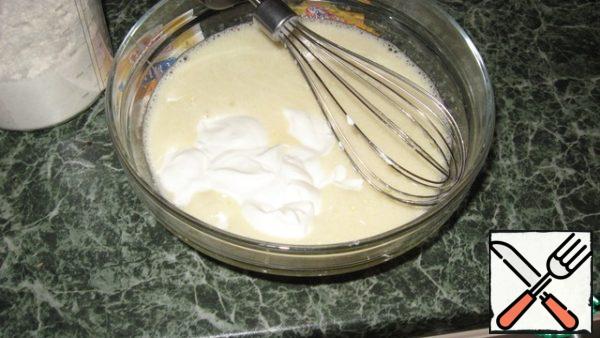 Add sour cream and condensed milk, beat well.