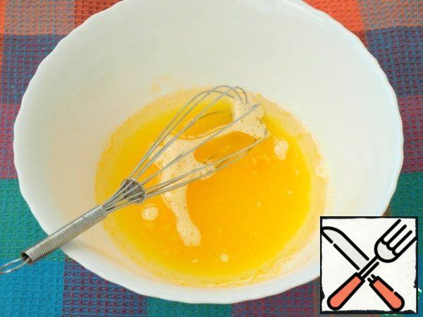 Add refined sunflower oil to the bowl and mix.