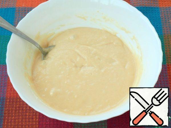 Sift the flour with baking powder and mix the dough with a spoon until smooth.
Flour may need a little more 20-25 g, as it is different in density.
The dough should be like thick sour cream.
