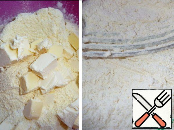Sift wheat, corn flour with salt and baking powder into a bowl. Add cold margarine, cut into cubes.