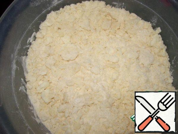 With a spoon, rub the butter with flour, you will get a crumb.
