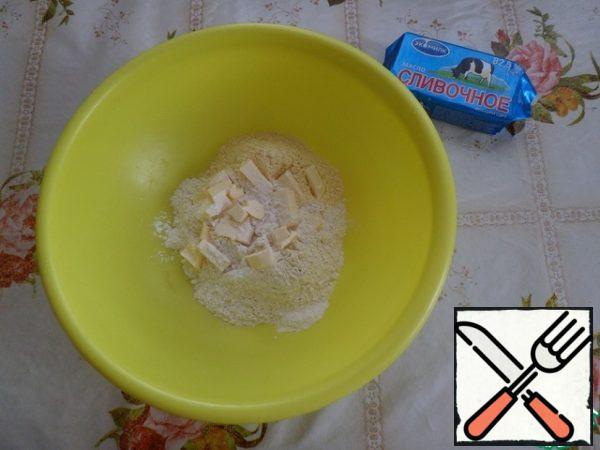 In a Cup sift both types of flour. add salt,sugar, baking powder and butter.