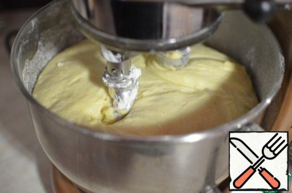 Leave the dough covered with a towel for an hour and a half. For lifting. After this time, the dough should be kneaded.
