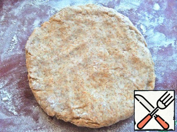 Transfer to a board or a mat sprinkled with flour.
