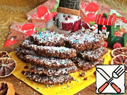 When cool and grab, separate the portions and decorate with sugar sprinkles. Served on new year's children's table. They are crispy and crumbly, but keep the shape.