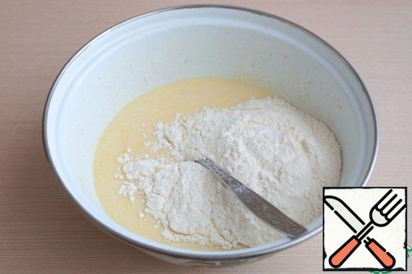 Gradually, add the total amount of flour in portions, about 3.5 cups. Knead dough. Cover the container with the dough with cling film and put it for lifting.