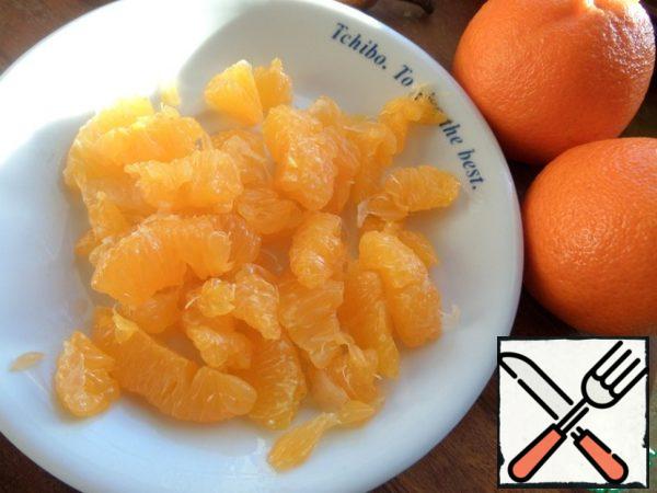 Peel the tangerine slices from the films.