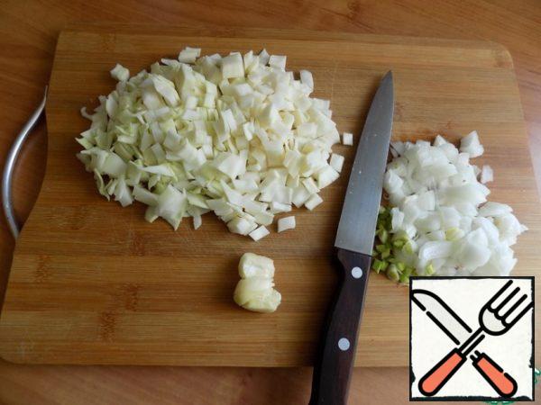 Cabbage and onions should be finely cut.