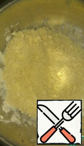 Mix flour with baking powder. Add the butter cut into pieces and RUB into crumbs with your hands.