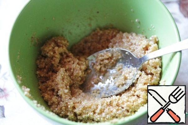 Put the resulting nut crumbs in a bowl and carefully combine it with water to get a homogeneous paste (I had to add about 0.5 tablespoons of water).