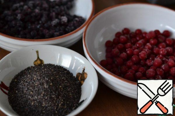 Defrost the berries. Mash the berries with a fork into a mush.
