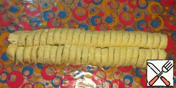Cut into pieces about 1 cm thick.
