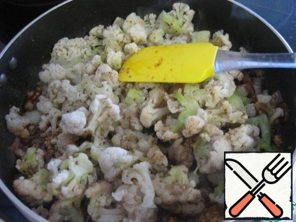 Add the cabbage, mix well.
