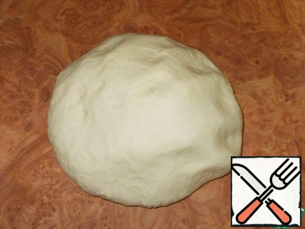 Depending on the flour quality you may need 1 tbsp the Main thing the dough came out soft and does not stick to hands! It takes me exactly 2.5 glasses. Knead the dough for 5-7 minutes actively kneading on the table.