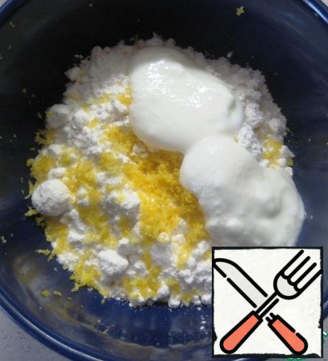 For the glaze: thoroughly mix the powdered sugar, zest of half a lemon and yogurt.