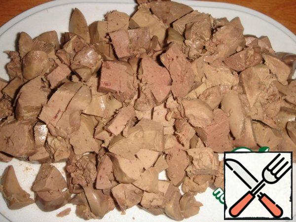 Chicken liver wash, boil in salted water, cool and cut into cubes.