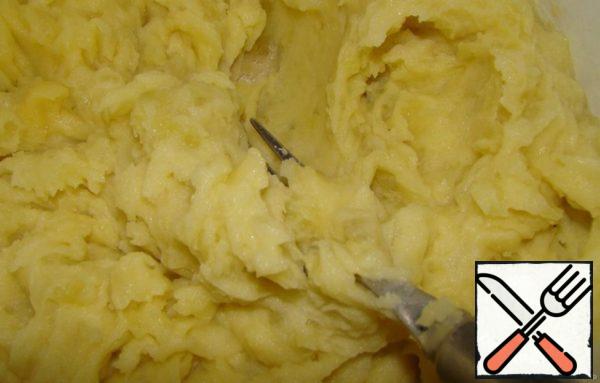 Mash the potatoes with a fork add egg..stir until smooth.