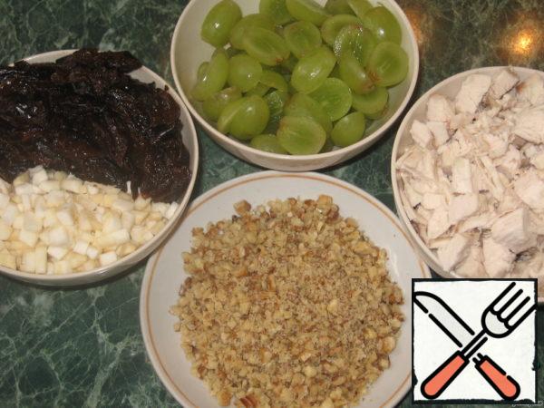 Chicken fillet cut into small cubes,
celery root-very small cubes,
prunes - sticks, grapes cut in half.