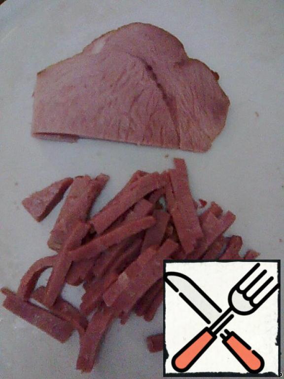 Cut the pork into strips or bars.