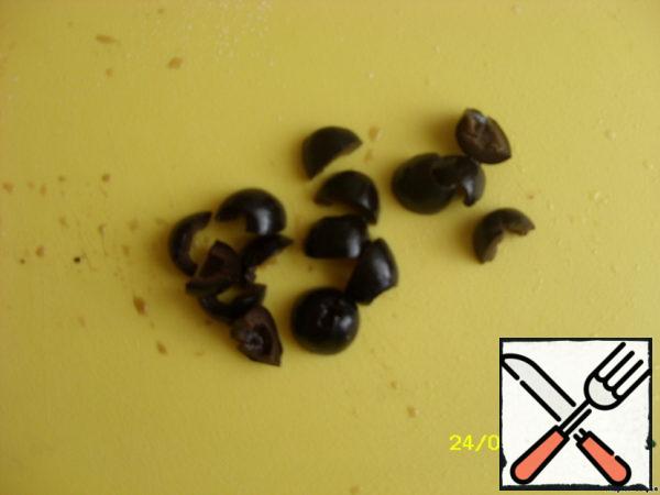Olives cut into 4 parts.