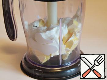 Beat in a mixer softened butter and sour cream.