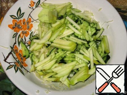 Add the Apple cut into strips to the salad. Sprinkle the Apple with lemon juice.