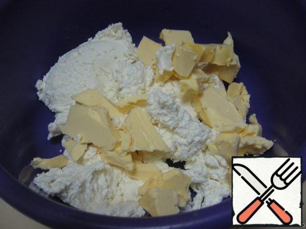 Grind cottage cheese with softened butter (do not heat the butter!).
