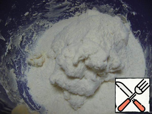 Add the sifted flour, mix until smooth.
