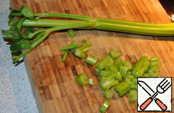 Wash and chop the celery.
