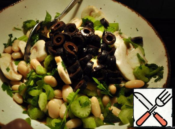 Olives and, optionally, olive oil or mayonnaise, as you like. You can also add white chicken, of course, boiled and finely chopped.
