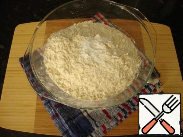 RUB hands into crumbs, add baking powder and salt.