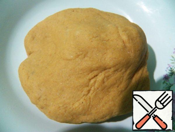Knead the dough well. It is steep, but elastic and does not stick to hands and work surface, does not tear, if thinly roll out.