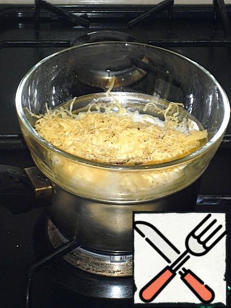 Put on a water bath, on medium heat. Stir constantly with a whisk.