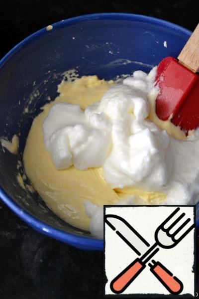 In 3 admission to introduce beaten egg whites into the dough, each time gently stirring them with a spatula.