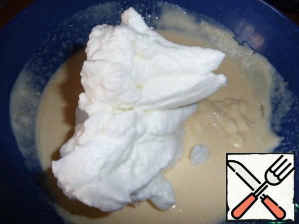 Egg whites beat in a strong foam, add to the curd mass.