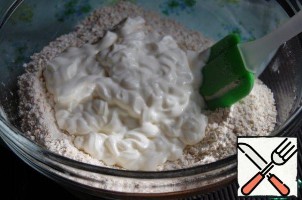 Then, add the soft (fat-free) cottage cheese. Stir into crumbs.