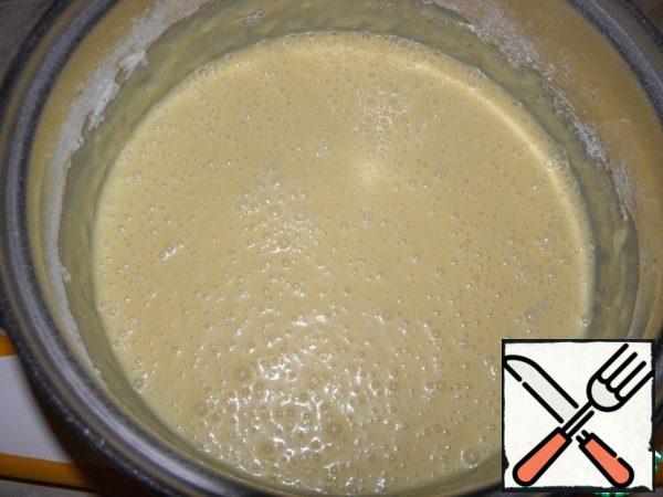 Flour mix with soda. Beat eggs with condensed milk and butter, add flour and soda to them, mix well.