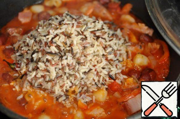 Add the rice mixture and stir.
