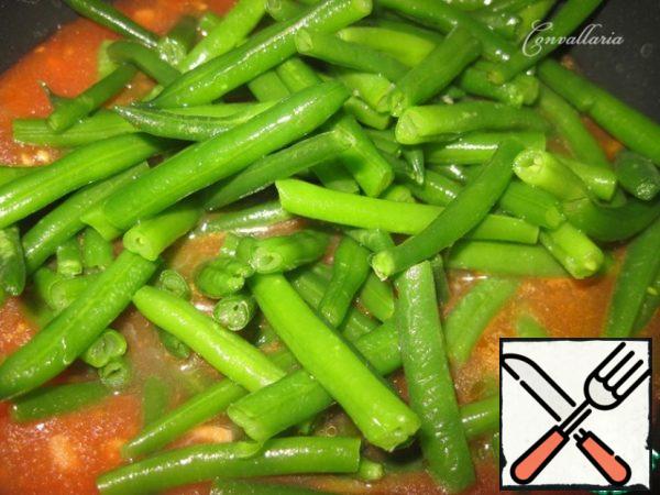 Add the green beans and bring to a boil.
