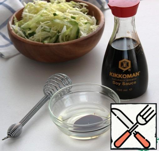 Stir vegetable oil with soy sauce.