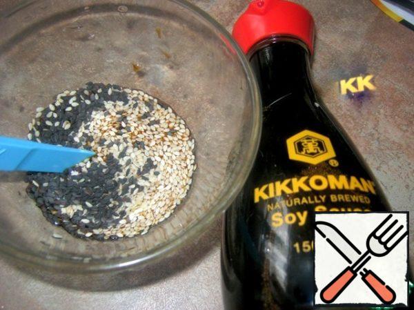 Mix soy sauce with sesame seeds, you can add a couple of tablespoons of water.