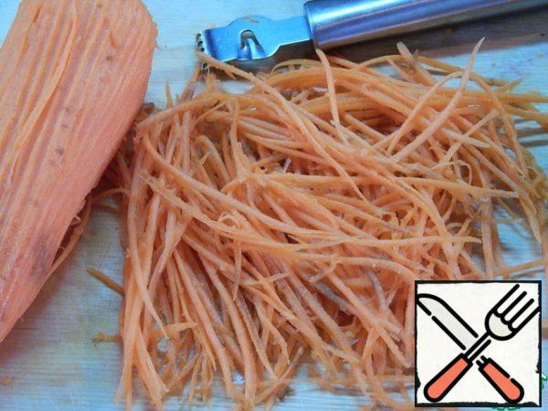 Meanwhile, chop the carrots.
