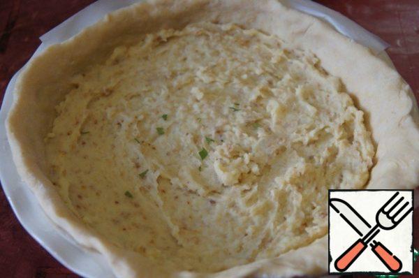 Put the mashed potatoes on top and smooth them out.
