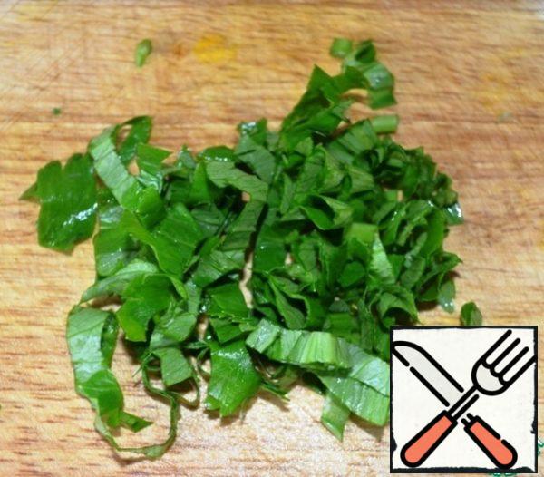 Finely chop the celery greens.
