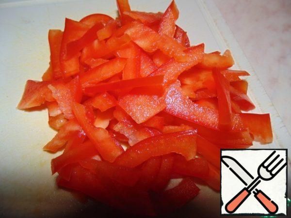 Sweet pepper is also cut into strips.