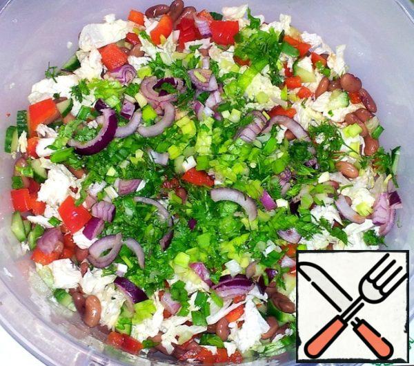 Finely chopped parsley and dill. Chop the green onions and put them in a bowl.
