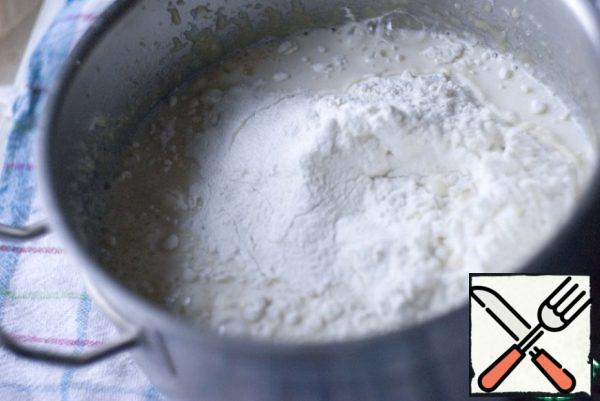 Add flour and baking powder.